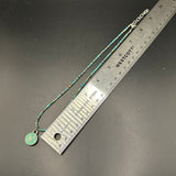 Green LV Pendant on Turquoise Beaded Necklace