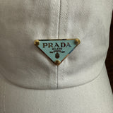 Upcycled Baby Blue/Gold Prada Tag Hat in White (undistressed)