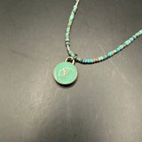 Green LV Pendant on Turquoise Beaded Necklace