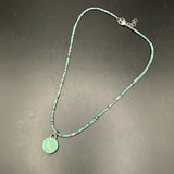 Green LV Pendant on Turquoise Beaded Necklace