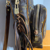 The Parrot Backpack - Monogram in Dark Brown Fringe