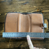 The Junco Bi-fold Short Wallet - Vintage Monogram in Chocolate